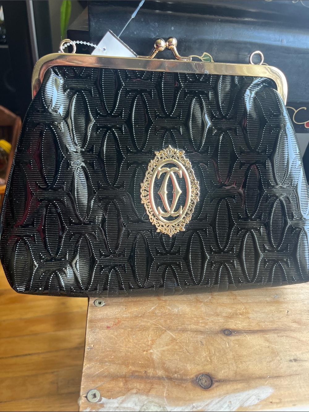 black patent clutch or make up bag